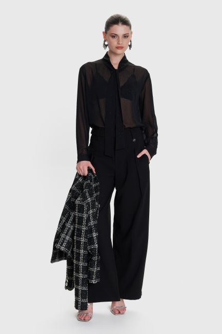 Trousers in loose fit - Black
